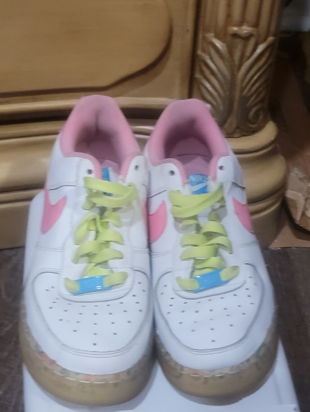 Nike White Sneakers with Pink Swoosh and Yellow Laces